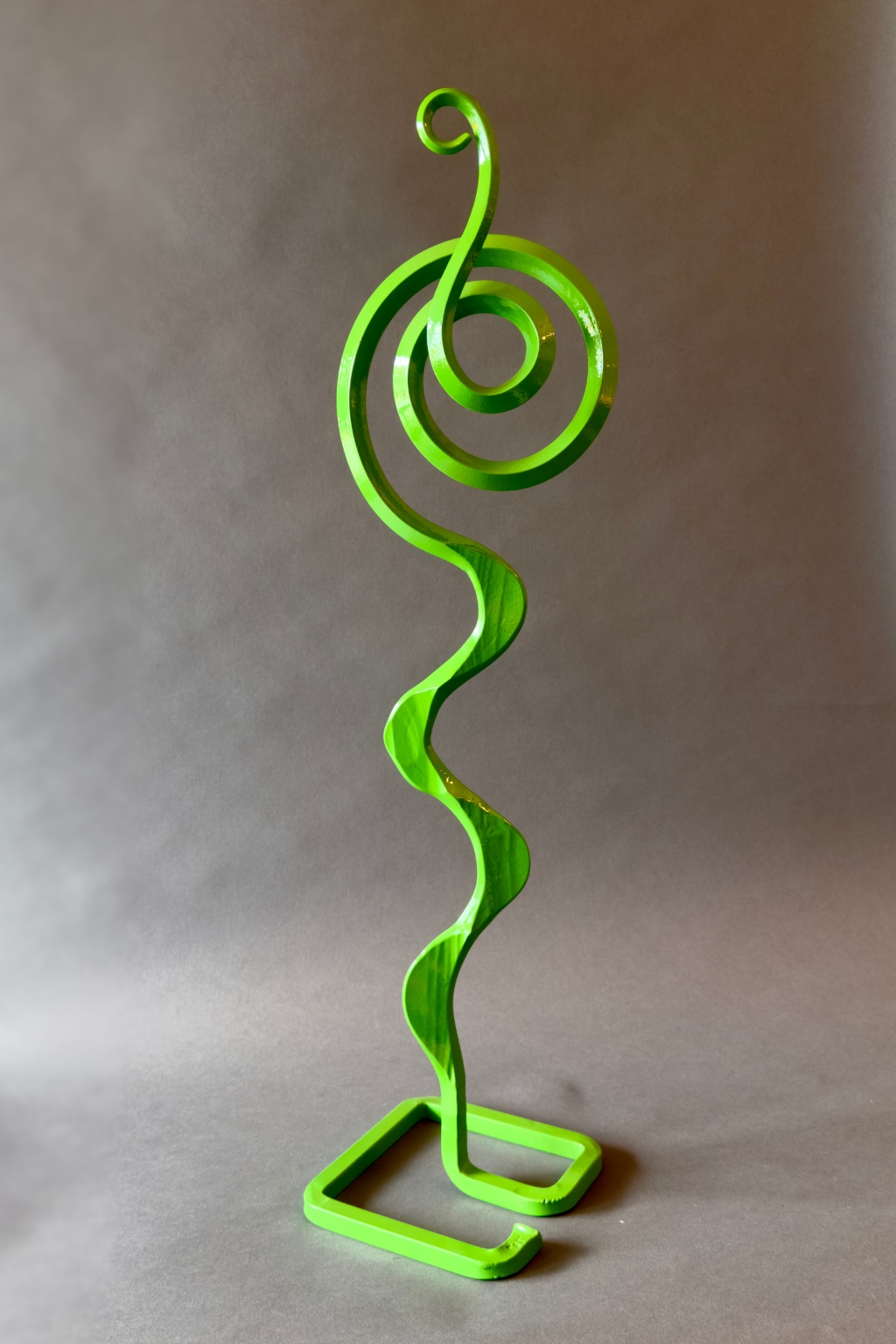 Small green steel scultpture.